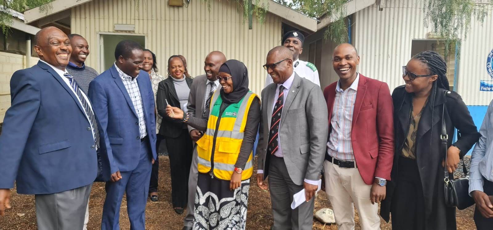 Group photo during a courtesy visit with county and security leadership